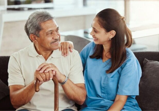 A woman and an older man holding hands.